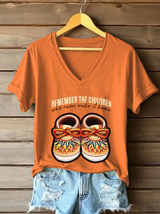 Women's remember the children who never make it home V-neck T-shirts