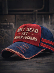 Ain't dead yet, motherfuckers Unisex hats